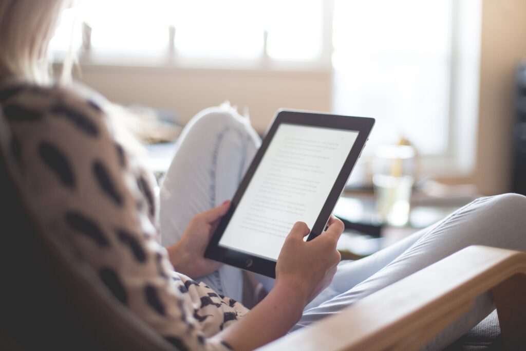woman reading ipad