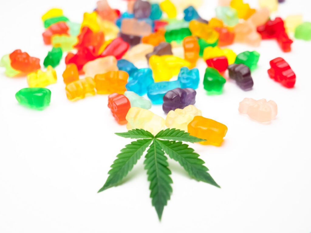 cannabis leaf and rainbow gummies