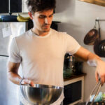 man cooking in kitchen